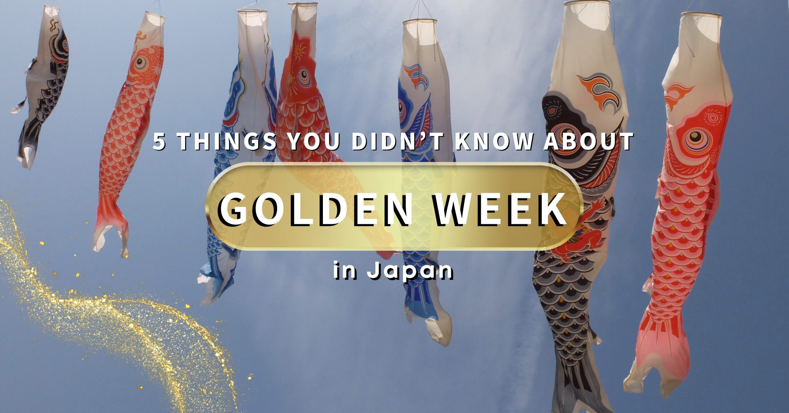 Colorful koinobori (carp streamers) flying against a clear blue sky in Japan, symbolizing celebration during Golden Week.